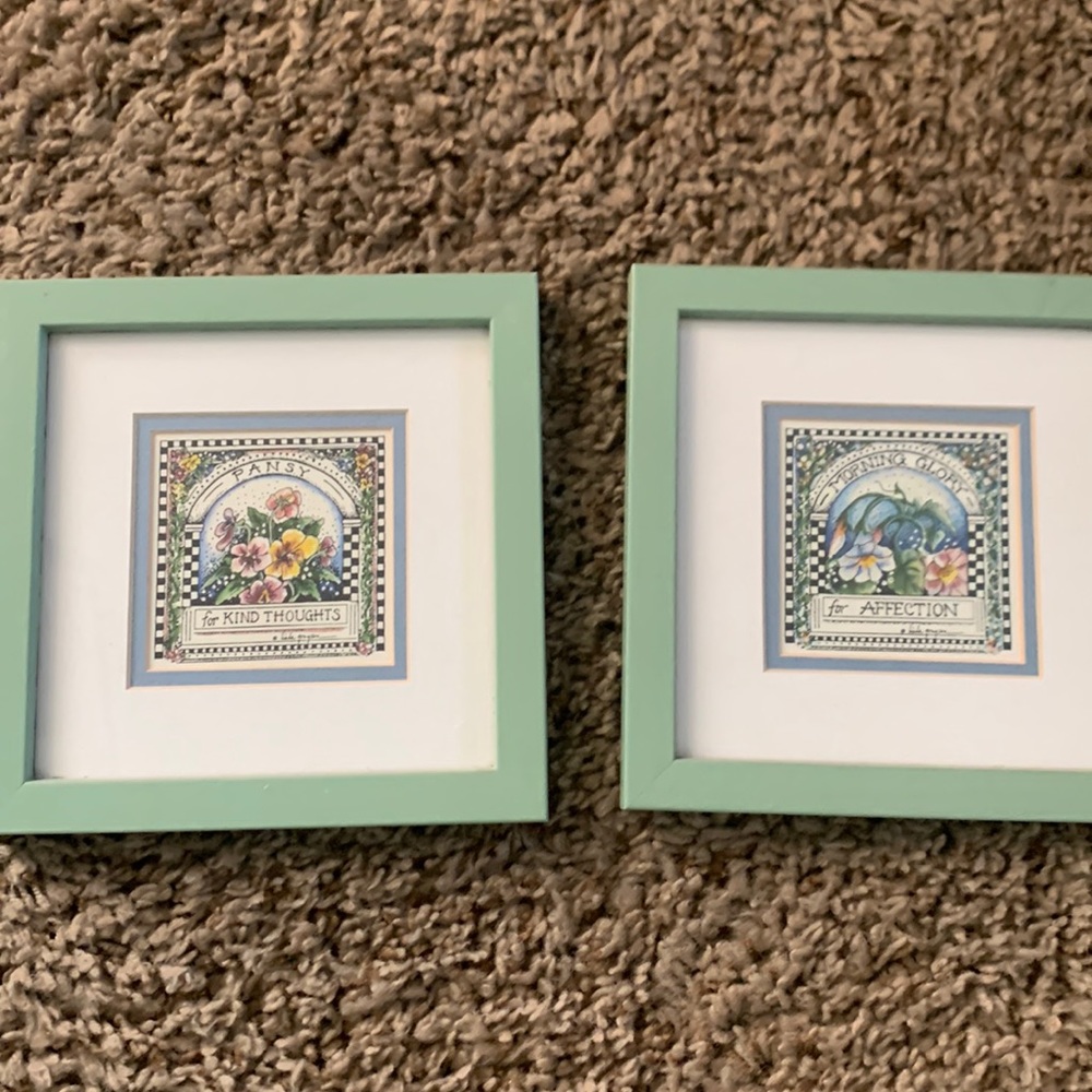 2 frames with flowers. 
Nice for bathroom